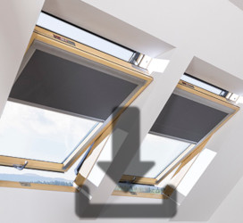 Pivot roof windows