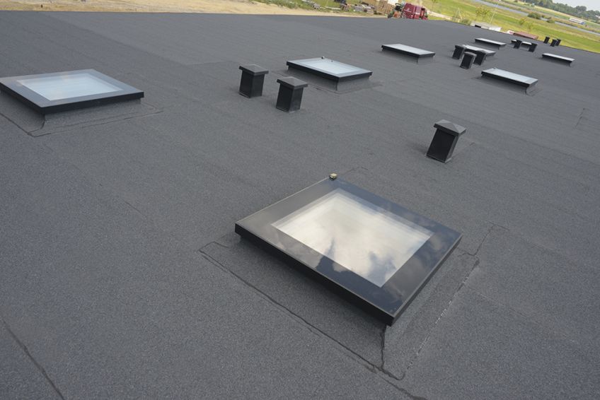 Insulated Flat-Roof Deck Mounted Skylights DEF, DMF, DXF - FAKRO